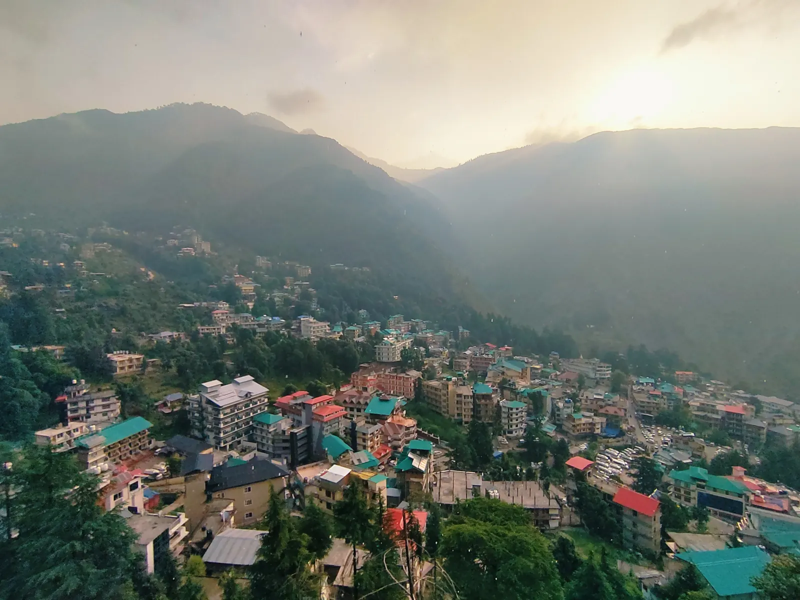 McLeod Ganj rooftops and forest in the soft morning light
